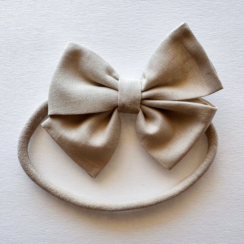 Truly Tan : Loopsie Bow